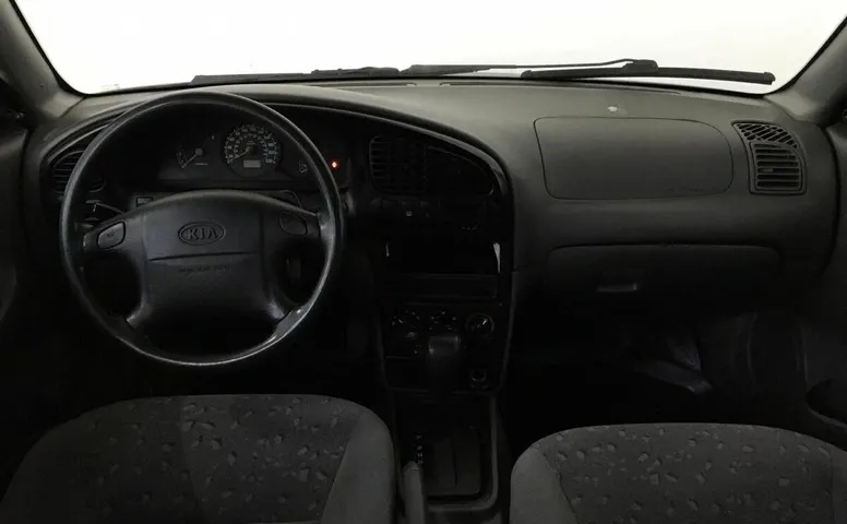 Kia SPECTRA 1.6 AT (101 л.с.)