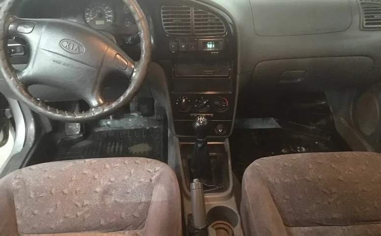 Kia SPECTRA 1.6 MT (101 л.с.)